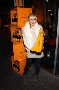 Tinsley Mortimer showing DKNY for Veuve Clicquot boots